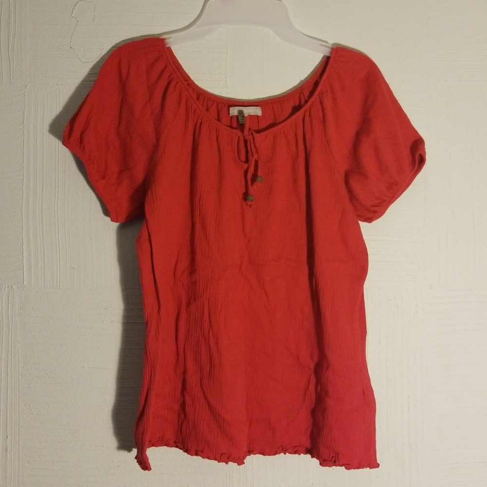 Allyson Whitmore red blouse